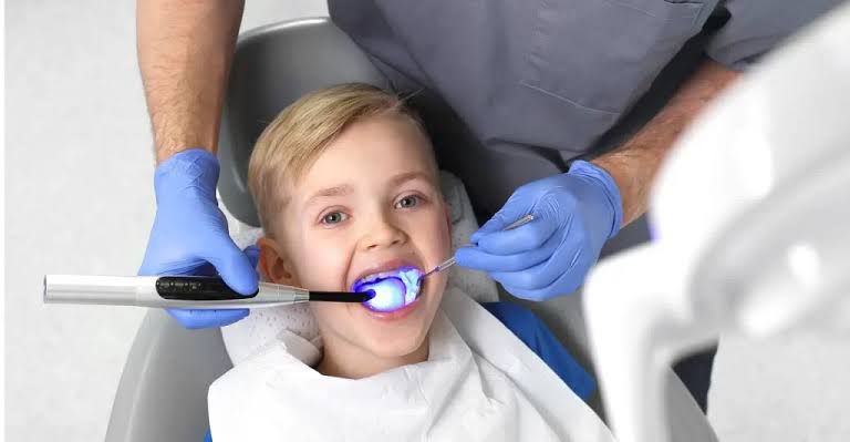 Child dental cleaning and fluoride treatment